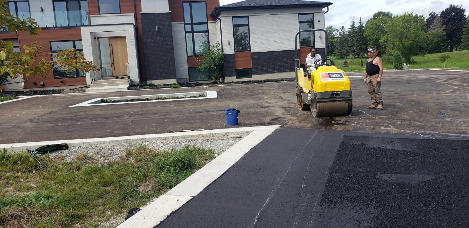 Parking lot compaction roller
